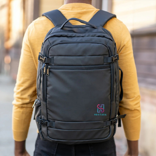 Man wearing sustainable product (backpack)